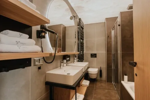 Kúpeľňa v rodinnom apartmáne